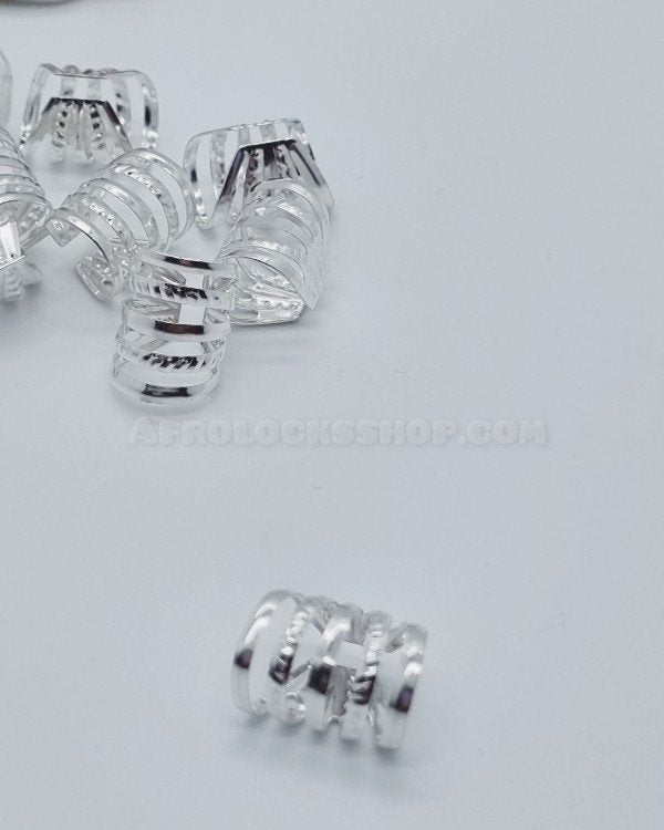 10 anneaux à cheveux type semainier couleur argent brillant et strass