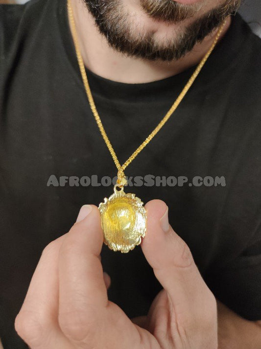 Chaîne fine pendentif tête de lion dorée