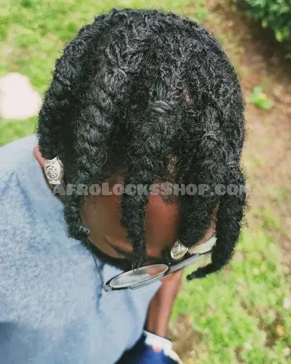 Top view of afro twists with silver hair cuffs, natural hair accessories for locs