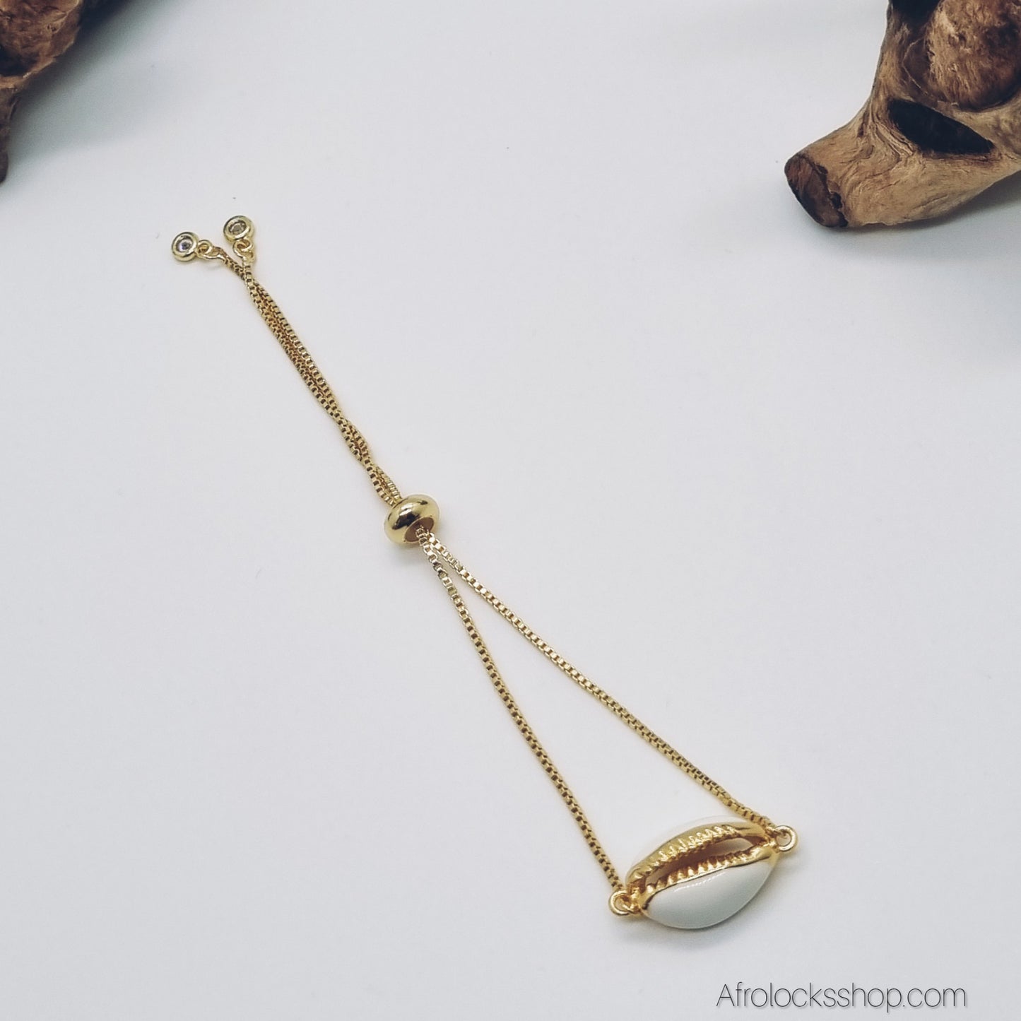 Bracelet cauri synthétique doré – chaîne coulissante ajustable avec pampilles strass