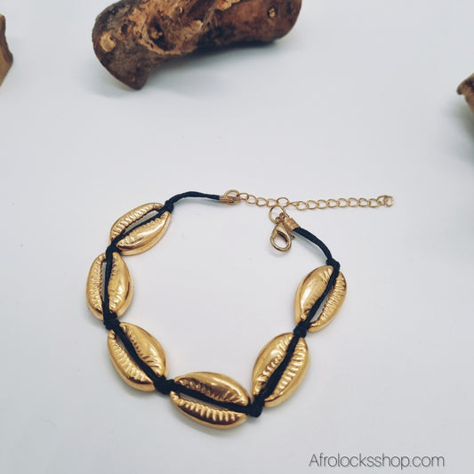 Bracelet cauris dorés – cordon noir, 19 cm réglable (mousqueton + chaîne)
