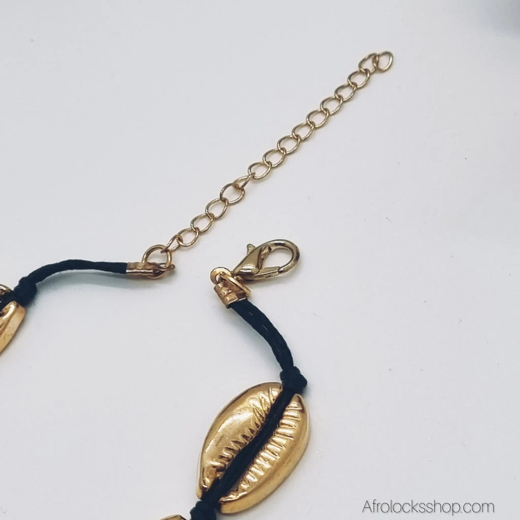 Bracelet_cauris_dores_sur_cordon_noir_2 - Afro Locks Shop