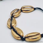 Bracelet_cauris_dores_sur_cordon_noir_3 - Afro Locks Shop