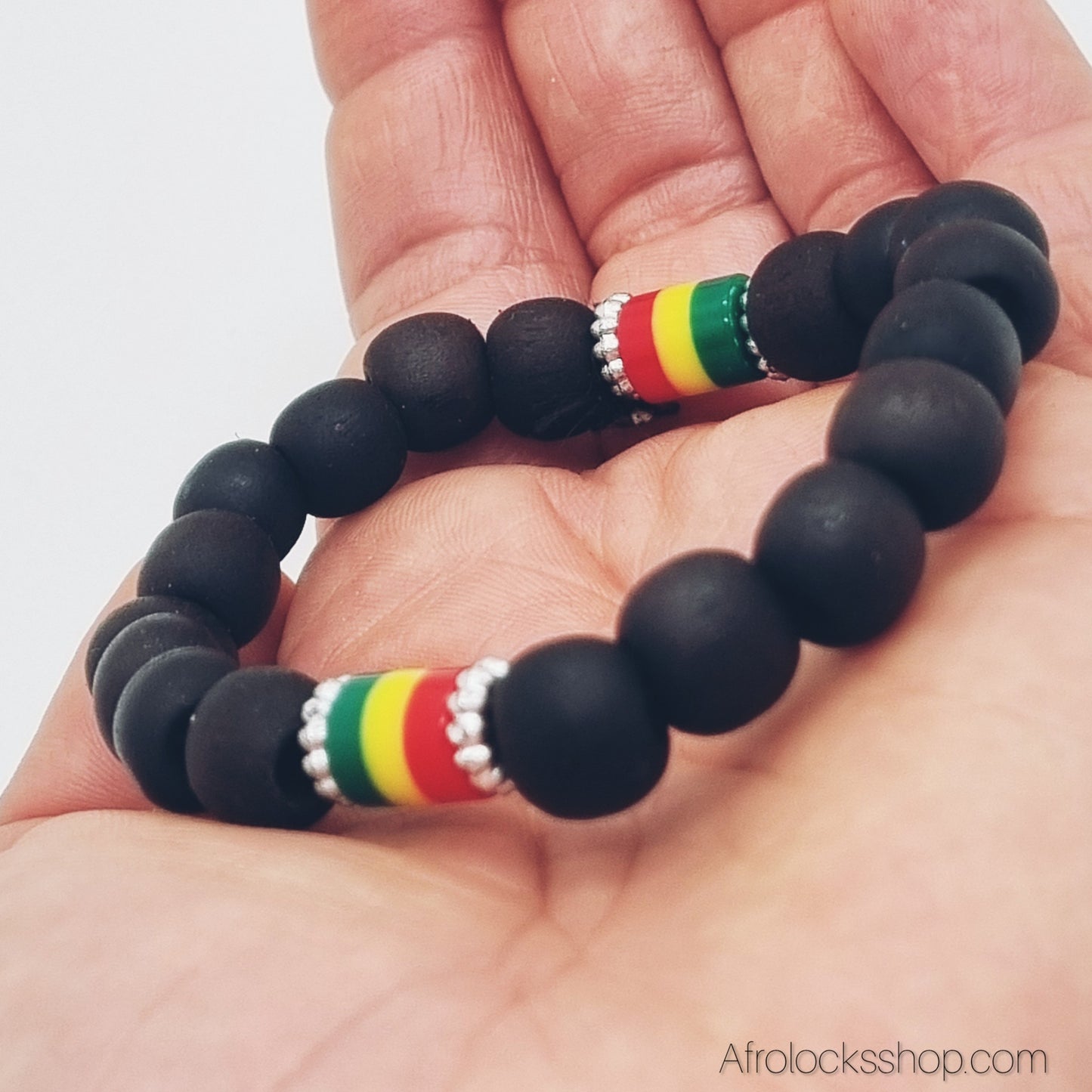 Bracelet Rasta – perles noires & tubes ❤️💛💚 avec strass – élastiqué (unisexe)