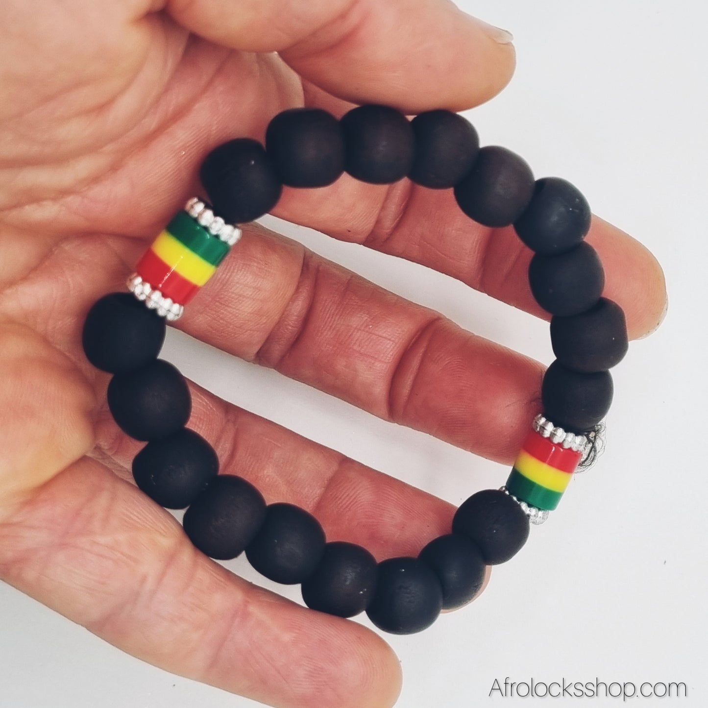 Bracelet Rasta – perles noires & tubes ❤️💛💚 avec strass – élastiqué (unisexe)