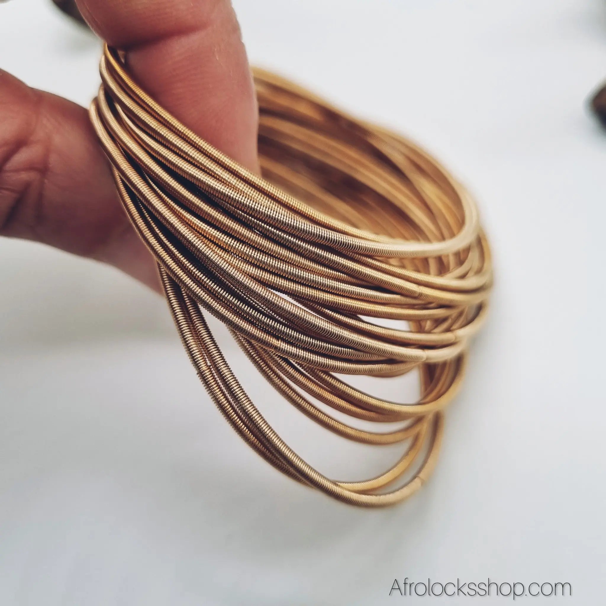 Bracelets_ressorts_dores_cordes_de_guitare_6 - Afro Locks Shop