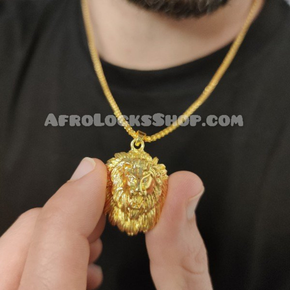 Chaîne fine pendentif tête de lion dorée