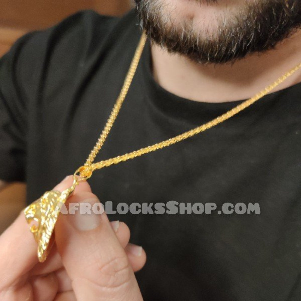 Chaîne fine pendentif tête de lion dorée