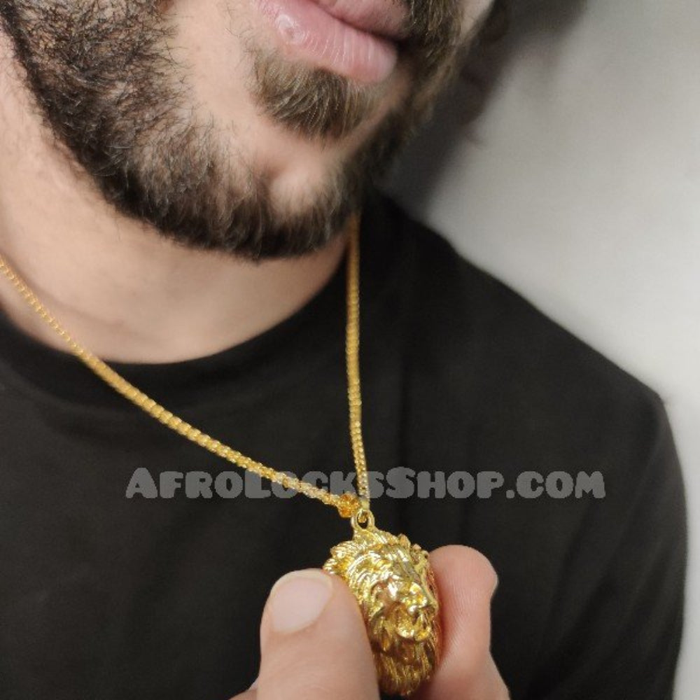 Chaîne fine pendentif tête de lion dorée
