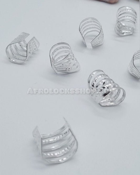 10 anneaux à cheveux type semainier couleur argent brillant et strass