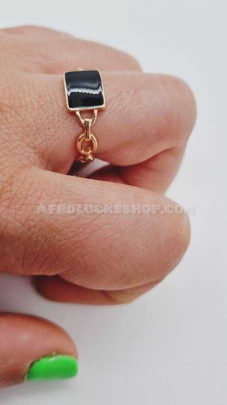 Bague ornée de 3 cauris en laiton et son lot de bagues