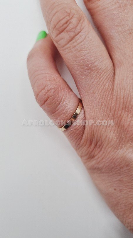 Bague ornée de 3 cauris en laiton et son lot de bagues