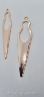 Pair of gold-toned abstract silhouette earrings for afro and natural hair accessories