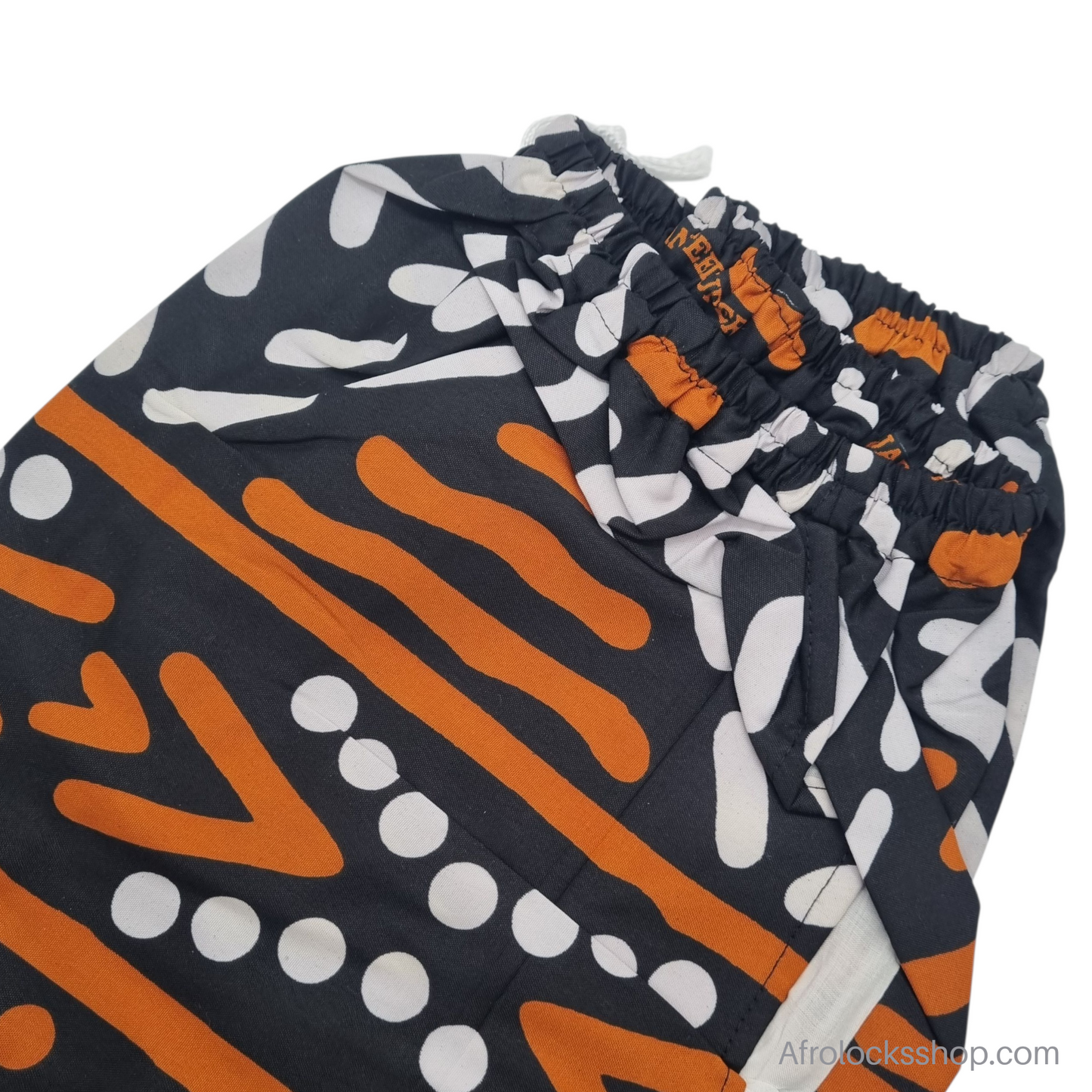 Pantalon wax unisexe « Baye Fall » – fait main au Sénégal (100% coton 🌍, poches, taille réglable)