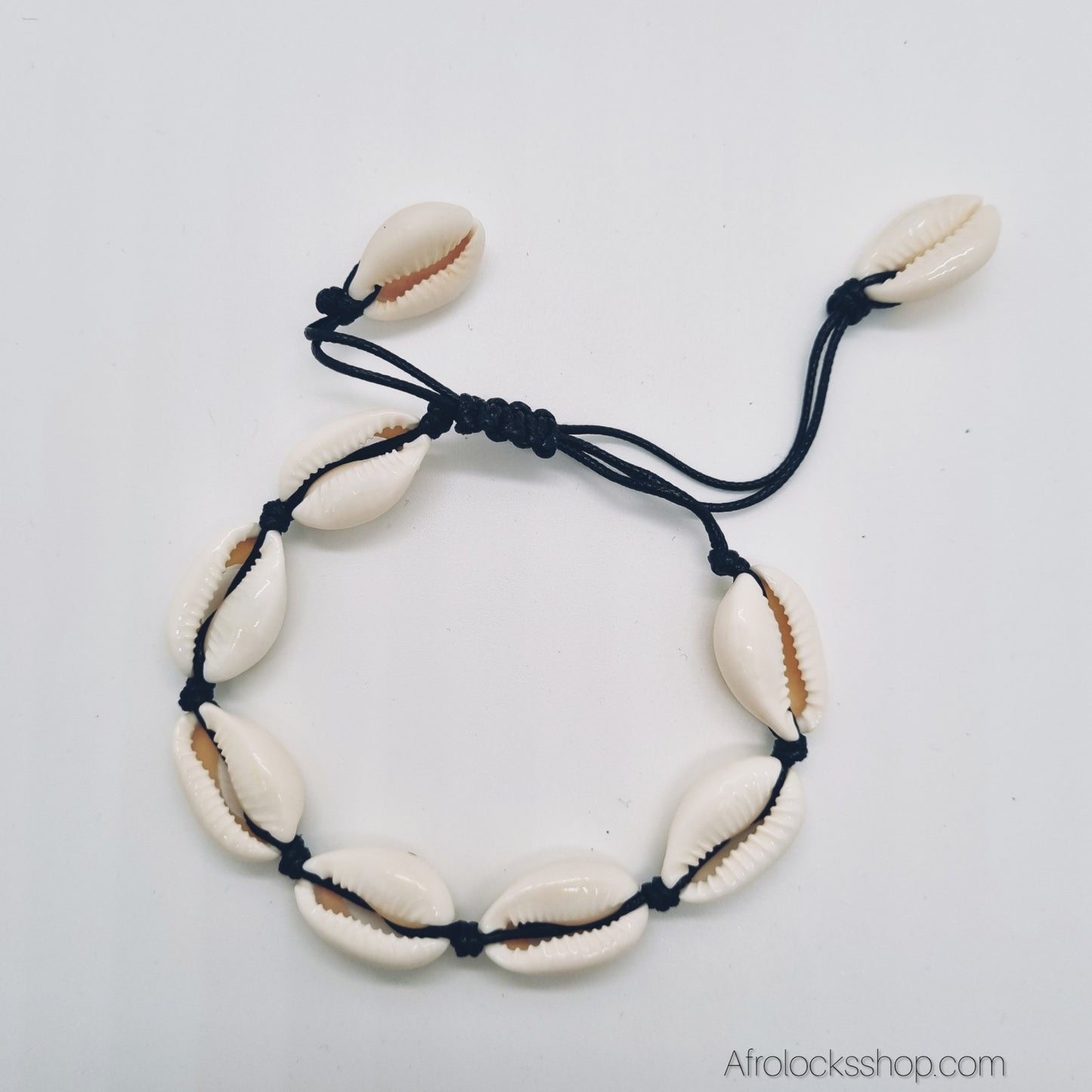 Parure cauris naturels – collier + bracelet ajustables (cordon noir)