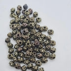 Set of small decorative zinc hair beads for braids, microlocks, and sisterlocks