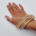Set_de_10_bracelets_ressort_dor_s_acier_inox_style_cordes_de_guitare_taille_unique_extensible_1 - Afro Locks Shop