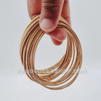 Set_de_10_bracelets_ressort_dor_s_acier_inox_style_cordes_de_guitare_taille_unique_extensible_3 - Afro Locks Shop