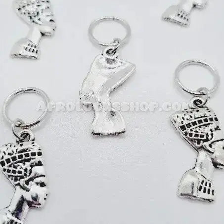 Silver hair jewelry charms shaped like an African queen bust for braids and locs.