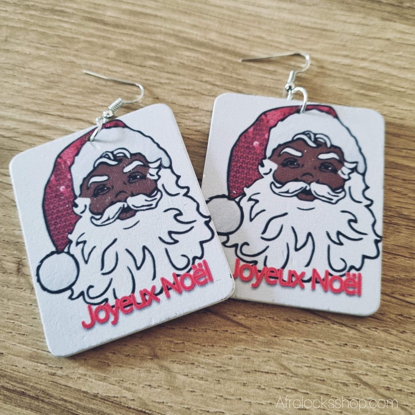 paire de boucles d'oreilles uniques avec pere noel noir culture afro