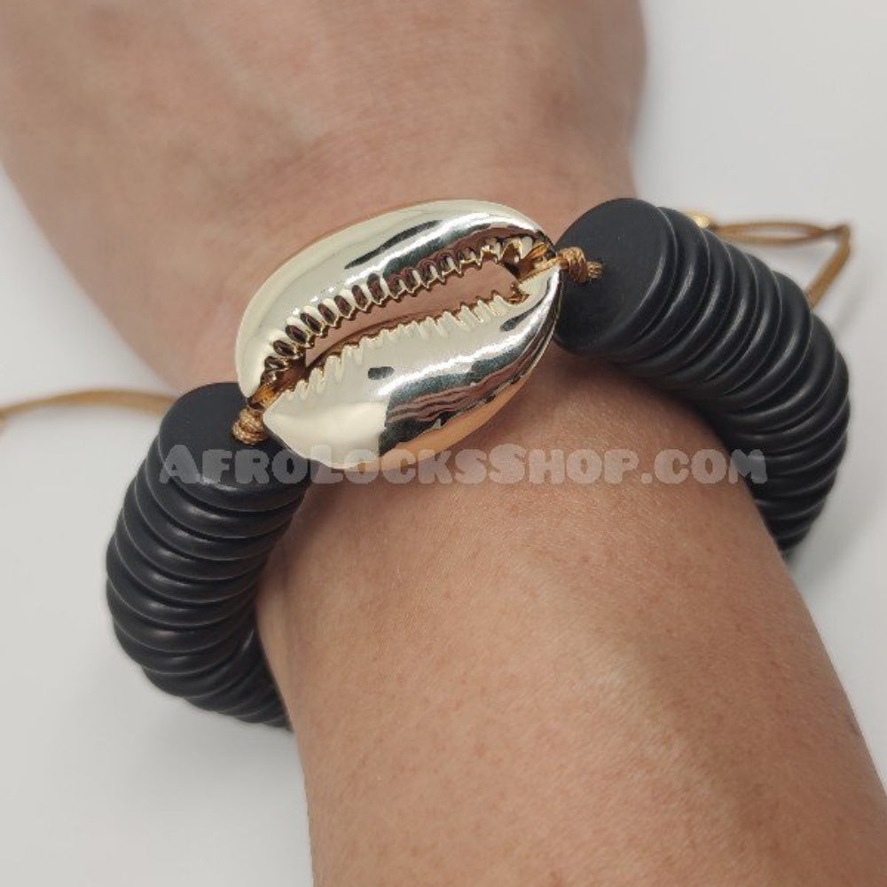 Bracelet noir grand coquillage cauri doré