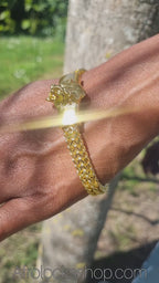 video bracelet dore tete de lion pour hommes et femmes